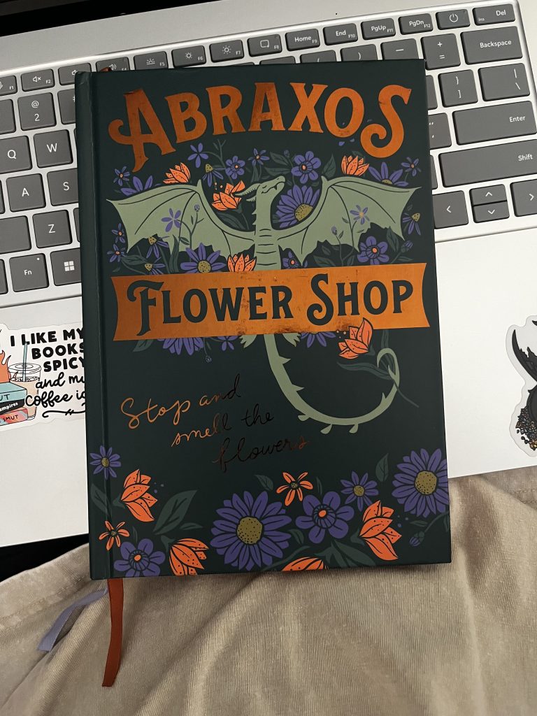 Abraxos Flower Shop journal inspired by Throne of Glass, featuring Abraxos surrounded by colorful flowers