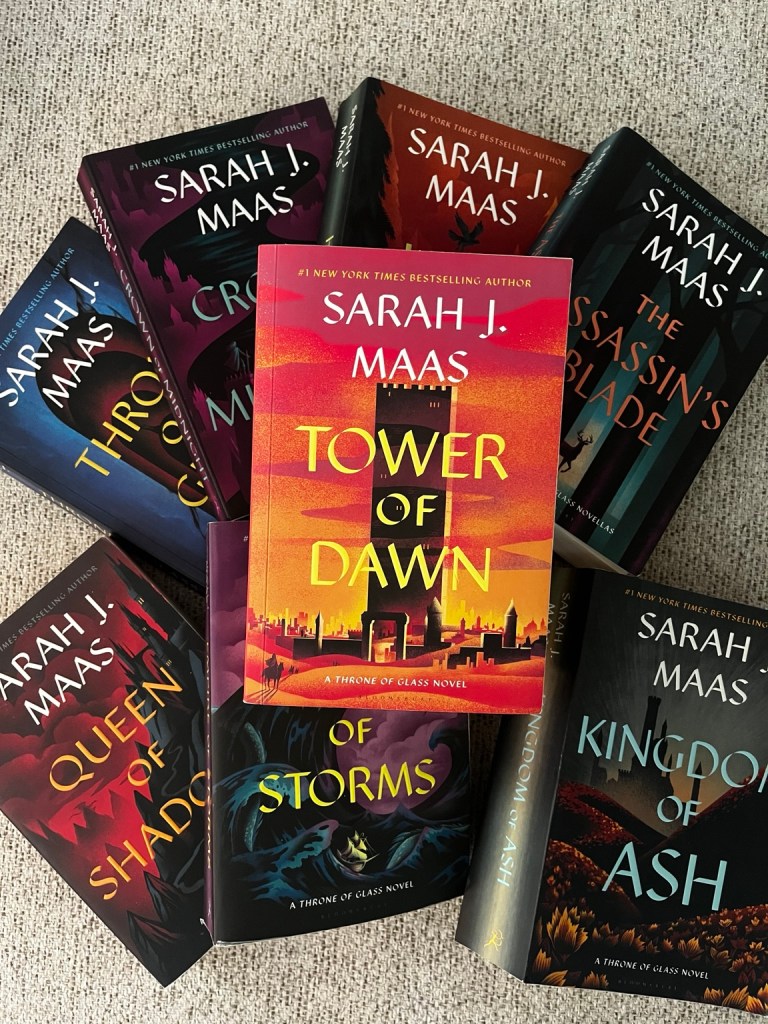 Tower of Dawn by Sarah J. Maas displayed with books from the Throne of Glass series